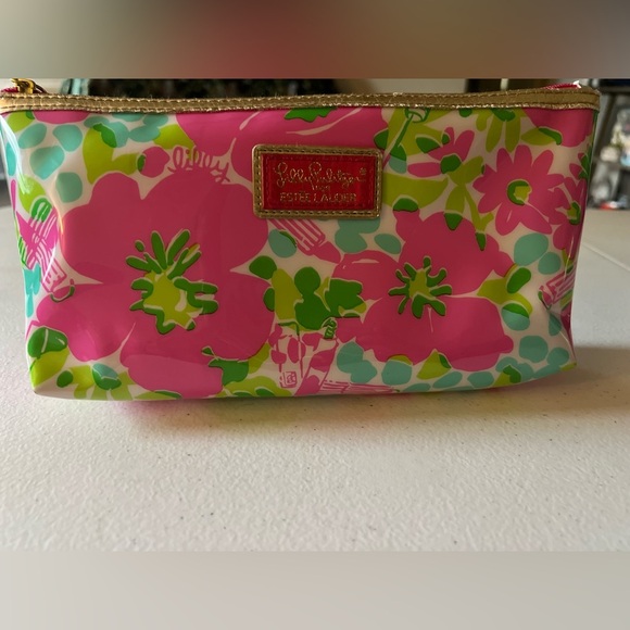 Lilly Pulitzer Handbags - Lilly Pulitzer for Estée Lauder PVC pink and blue floral makeup - travel bag